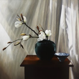 White magnolias in green vase